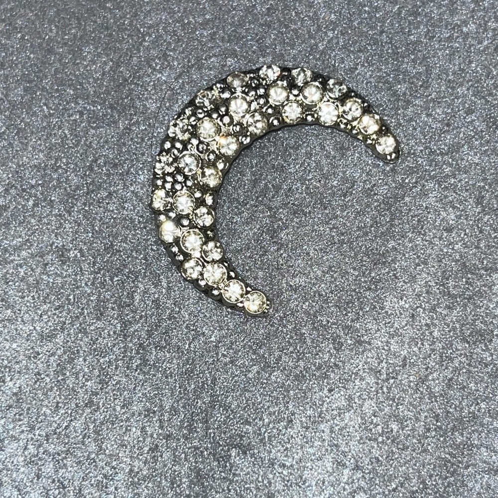 Moon shaped pin
